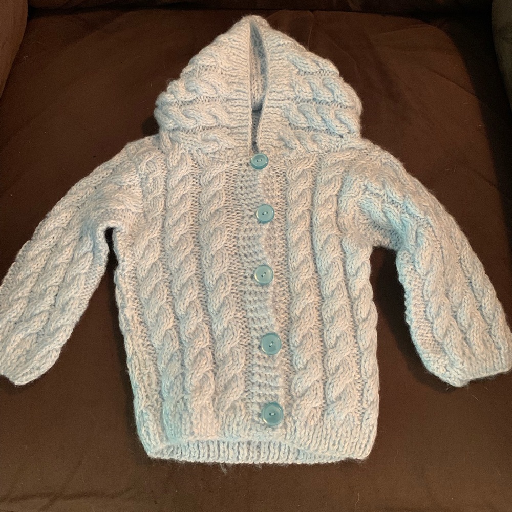 Homemade knit hooded baby sweater
